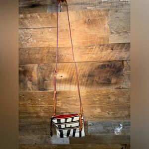 Dooney and Bourke Small Triple Zip Zebra Print Crossbody Bag
EUC